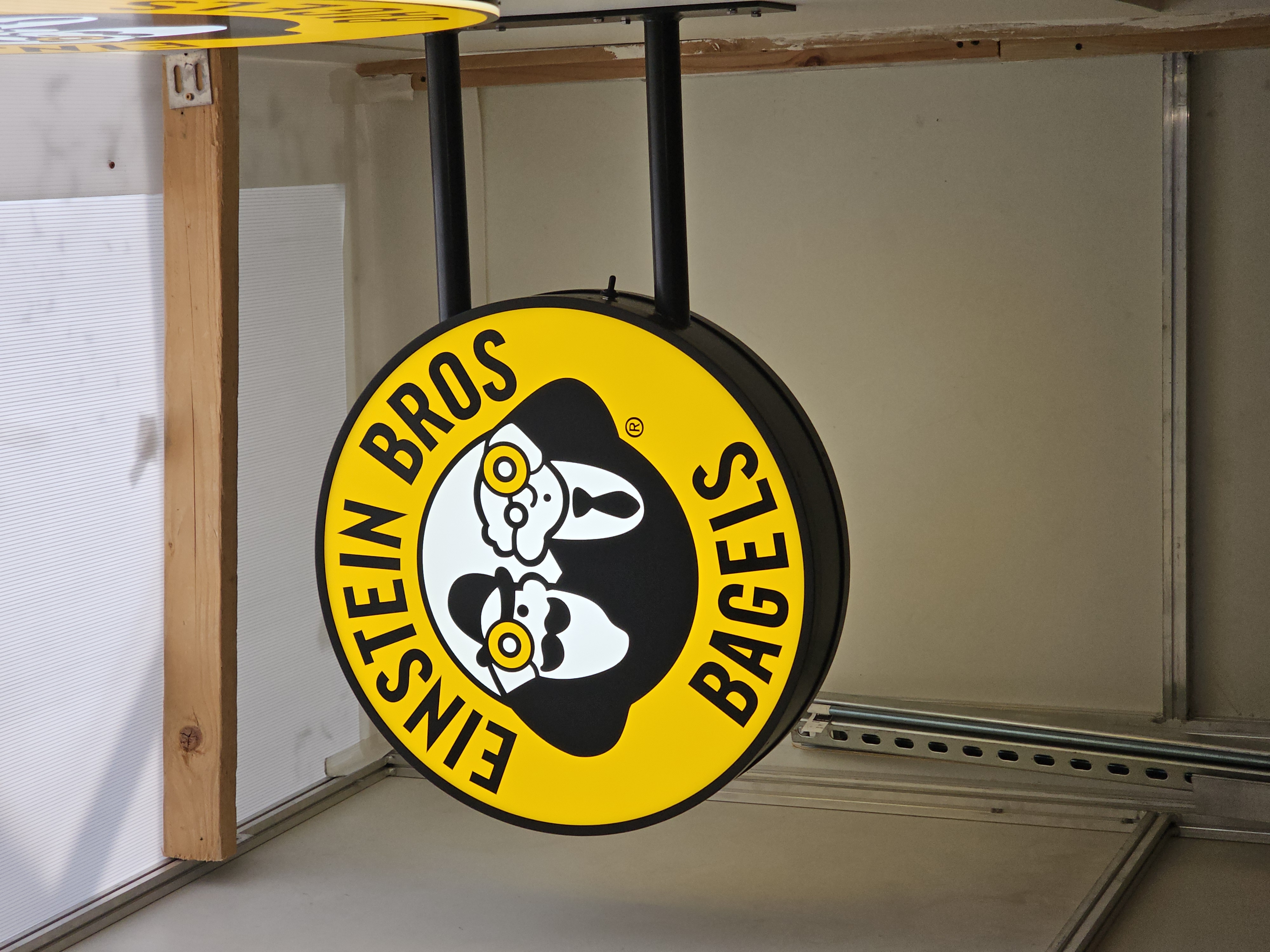 Einsten Bros Hanging Sign
