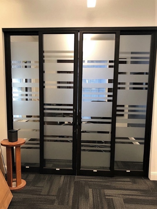 Frosted Vinyl Graphics by sign unlimited