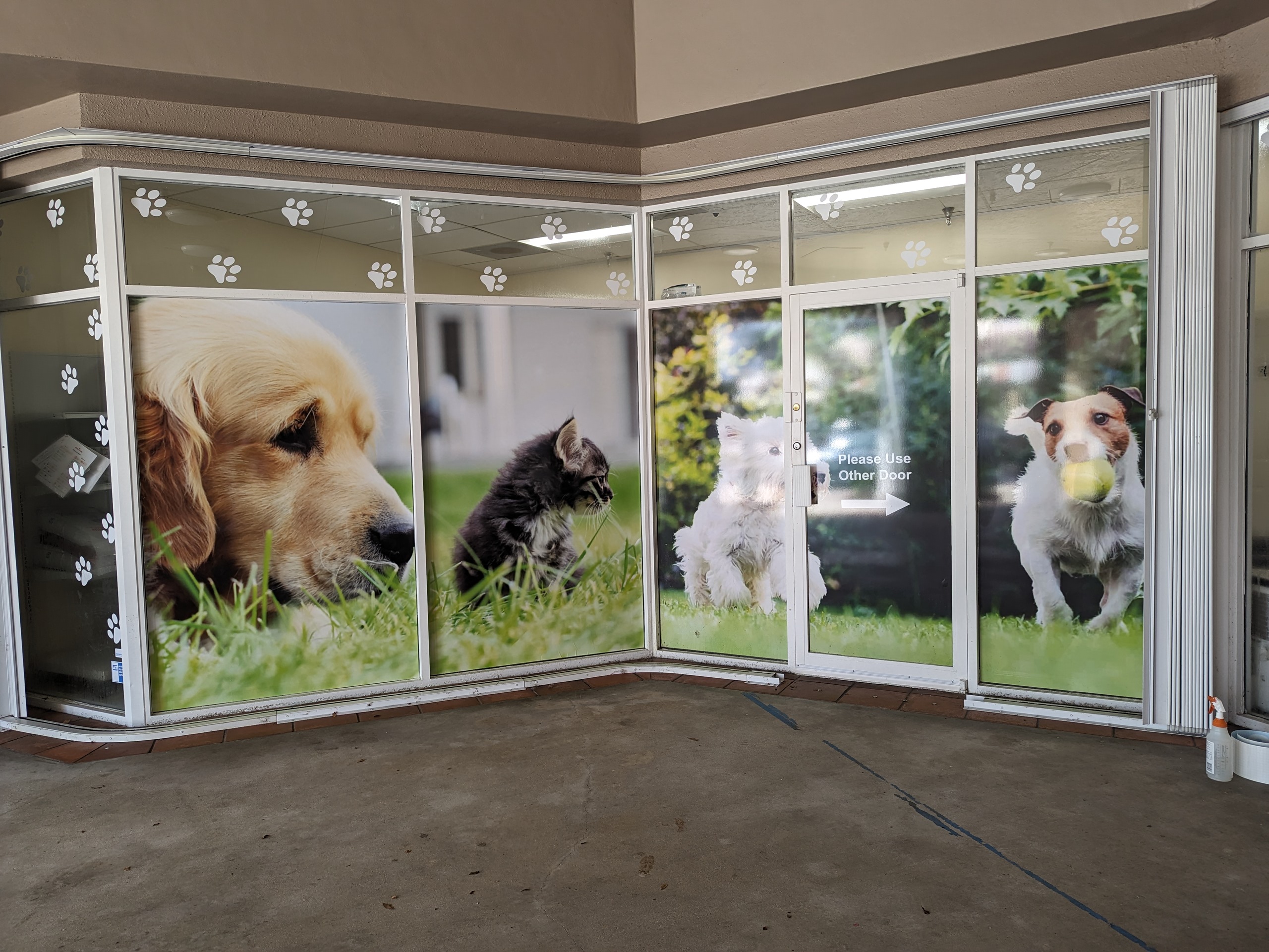 eco-friendly animal home storefront sign